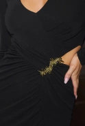 Martines – black maxi dress with decorative brooch