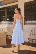 Mabel – blue embroidered peplum top
