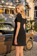 Sabrina – black mini dress with puff sleeves