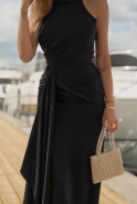 Anora – black maxi dress with train and halter neckline