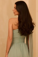 Serena - Asymmetrical maxi dress with loose, detachable sleeves and ruffled bottom