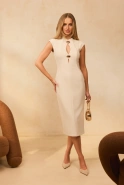 Fiametta – beige midi dress with decorative brooches