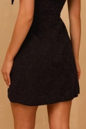 Sabrina – black mini dress with puff sleeves