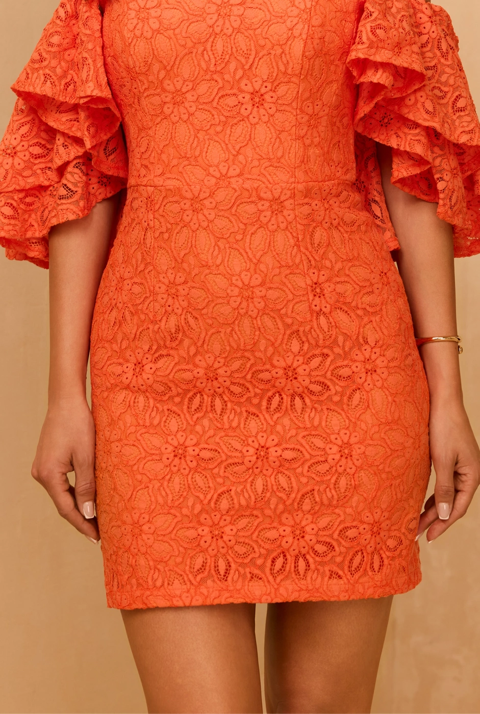 Sucre - Elegantes Minikleid aus Spitze in leuchtendem Orange