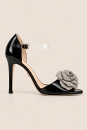 Iriza - black sandals with a decorative flower