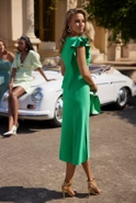 Noelia - Green midi dress with asymmetrical cut, decorative sleeves and sash