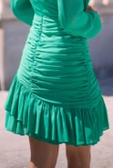 Clementine Green - aesthetics of drapery in a mini dress