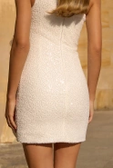 Hayat - asymmetrisches Kleid mit Perlen und abnehmbarem Jabot