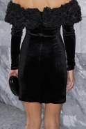 Vayana – black mini dress with floral embellishment