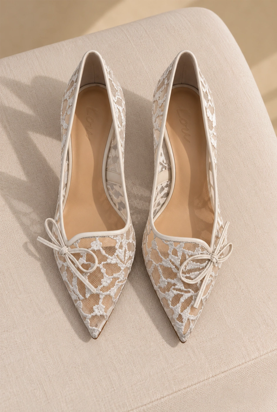Stina – embroidered ecru pumps
