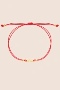 Lou bracelet on a red strap