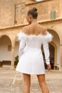 Becky - feathered dress with a flared bottom