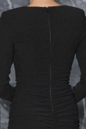 Uriona – black maxi dress with shoulder pads