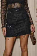 Ketnis - black mini with fringes on lace
