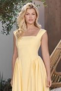 Yonca – yellow midi dress with square neckline