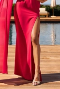 Della - a maxi dress with an asymmetric cut.