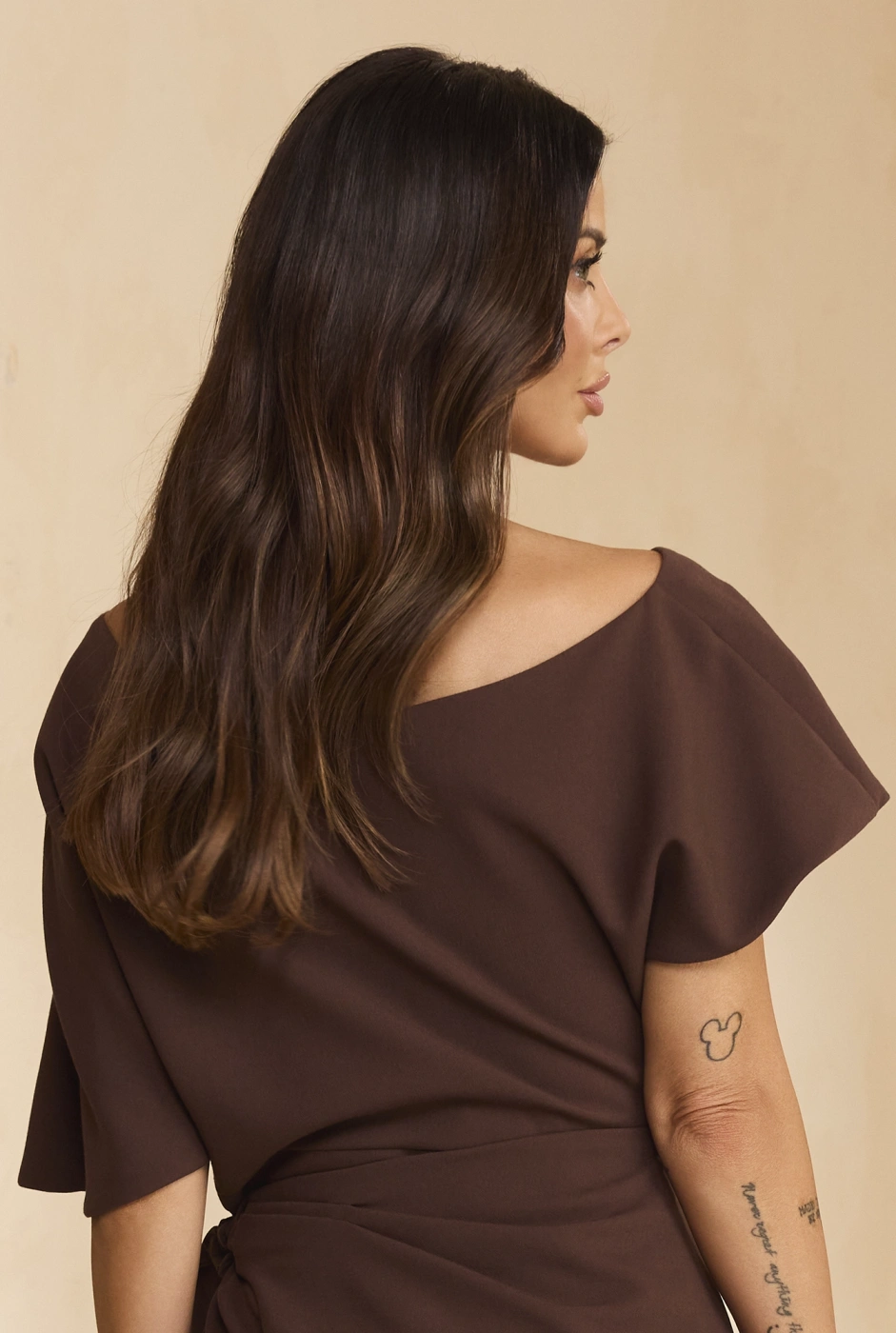 Padera – brown blouse with an asymmetrical neckline and peplum