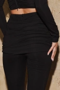Jasiri – black trousers with a jewellery detail