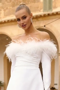 Becky - feathered dress with a flared bottom