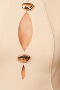 Fiametta – beige midi dress with decorative brooches