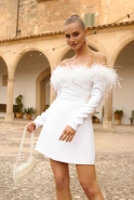 Becky - feathered dress with a flared bottom