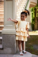 Tide - Gelbes Kinderkleid mit Buff-Ärmeln und Rüschen + Haarband