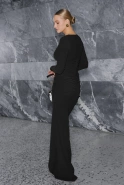 Uriona – black maxi dress with shoulder pads