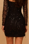 Ketnis – schwarzes Minikleid mit Fransen an der Spitze