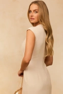 Fiametta – beige midi dress with decorative brooches