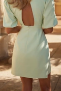 Shade - Mini dress in pastel mint with buff sleeves, V neckline and back cutout